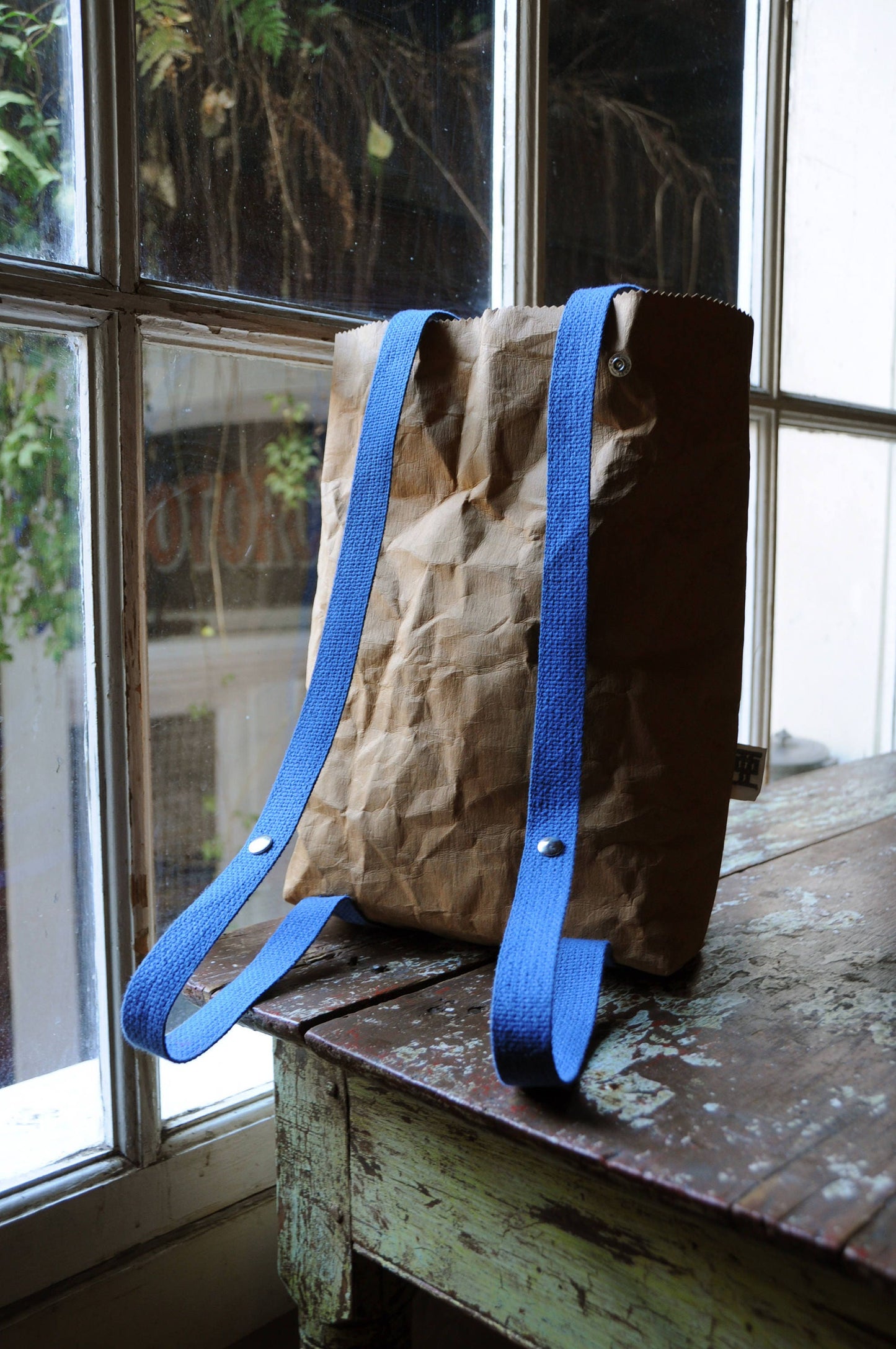 Two ways bag; Backpack and Tote back made from washable & reusable brown kraft paper