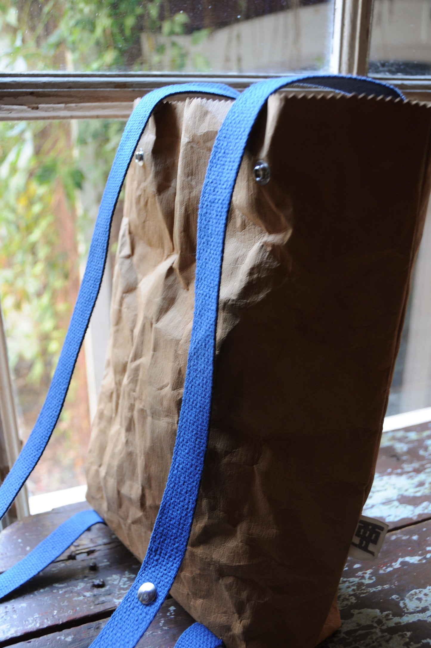 Two ways bag; Backpack and Tote back made from washable & reusable brown kraft paper