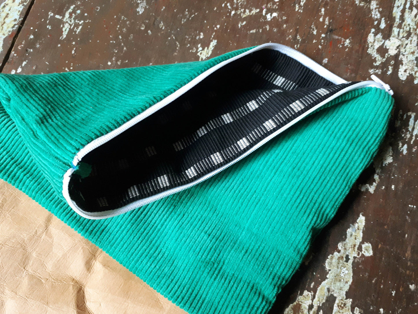 Fold over clutch bag made from washable kraft paper