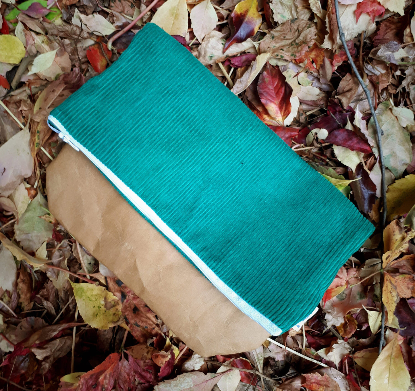 Fold over clutch bag made from washable kraft paper