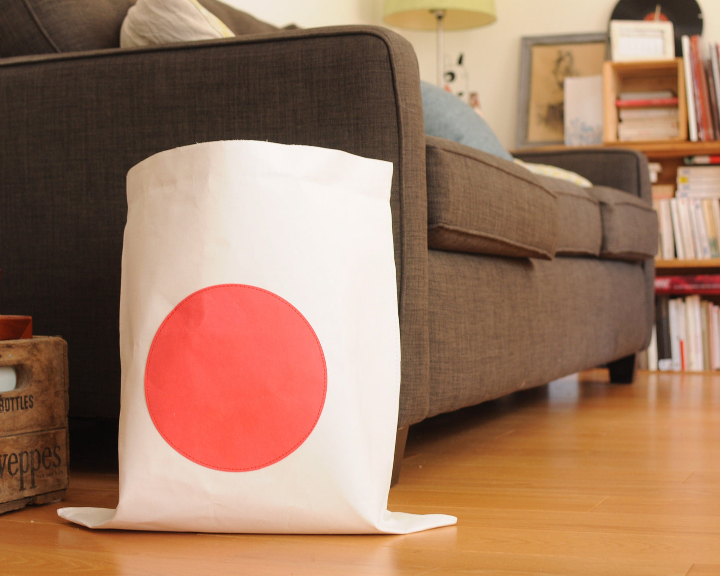 Paper bag storage with big red dot made from washable paper
