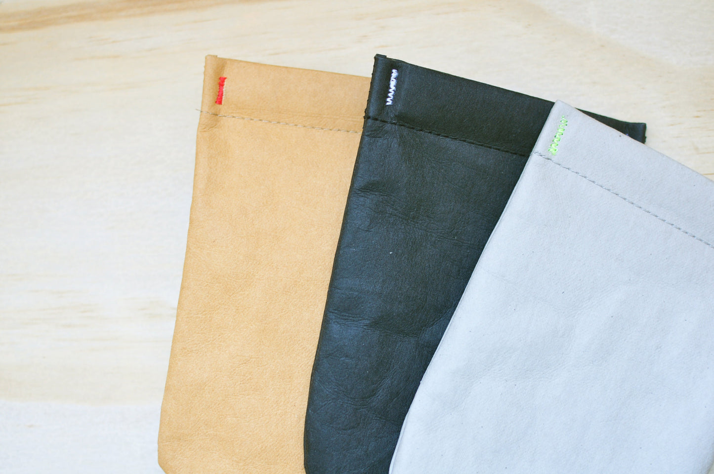 Eye glass case made from washable and reusable paper in BLACK, BROWN, GREY with snappy closure. Vegan Leather case as Pen & Sun glass case