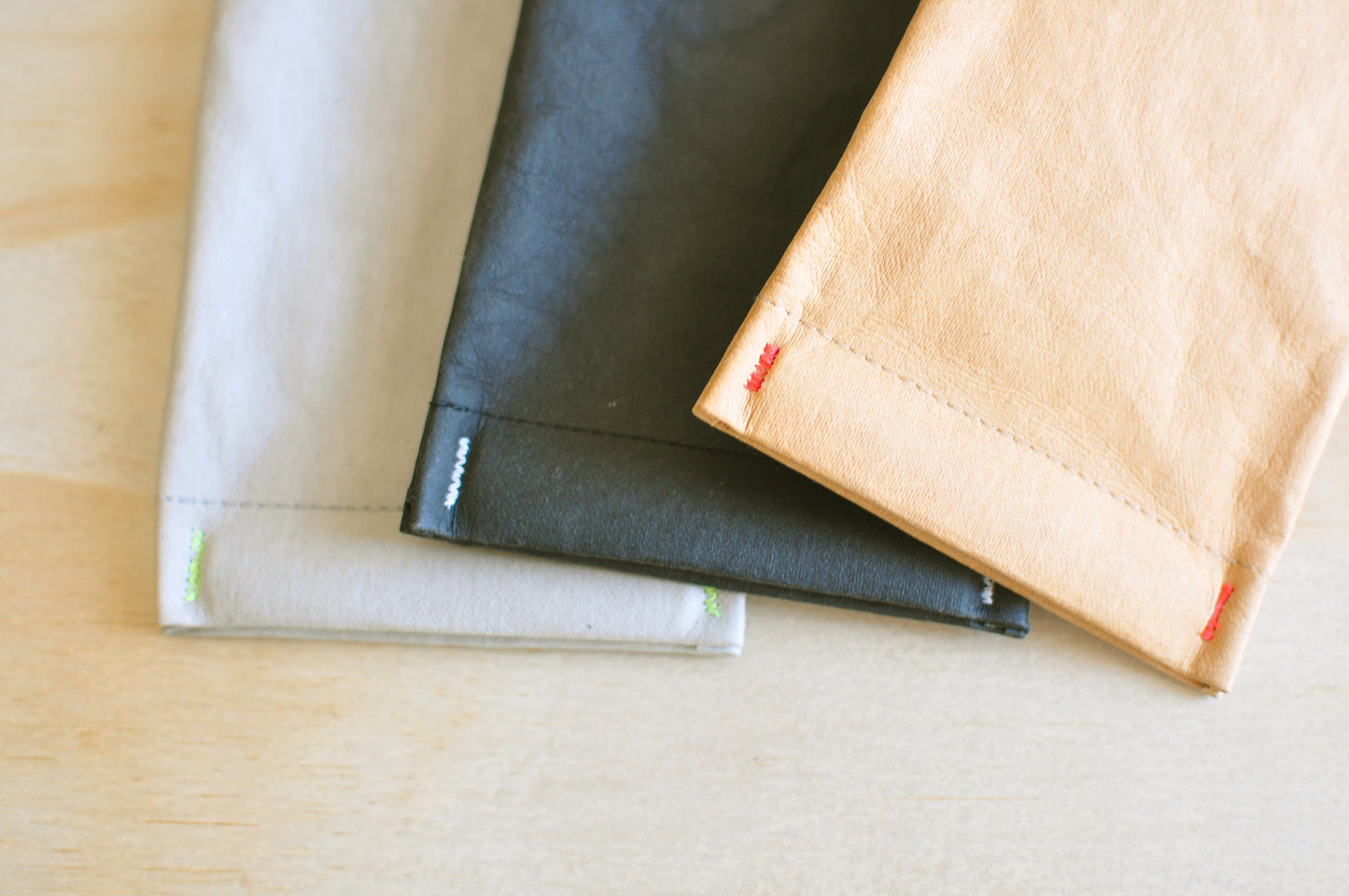 Eye glass case made from washable and reusable paper in BLACK, BROWN, GREY with snappy closure. Vegan Leather case as Pen & Sun glass case