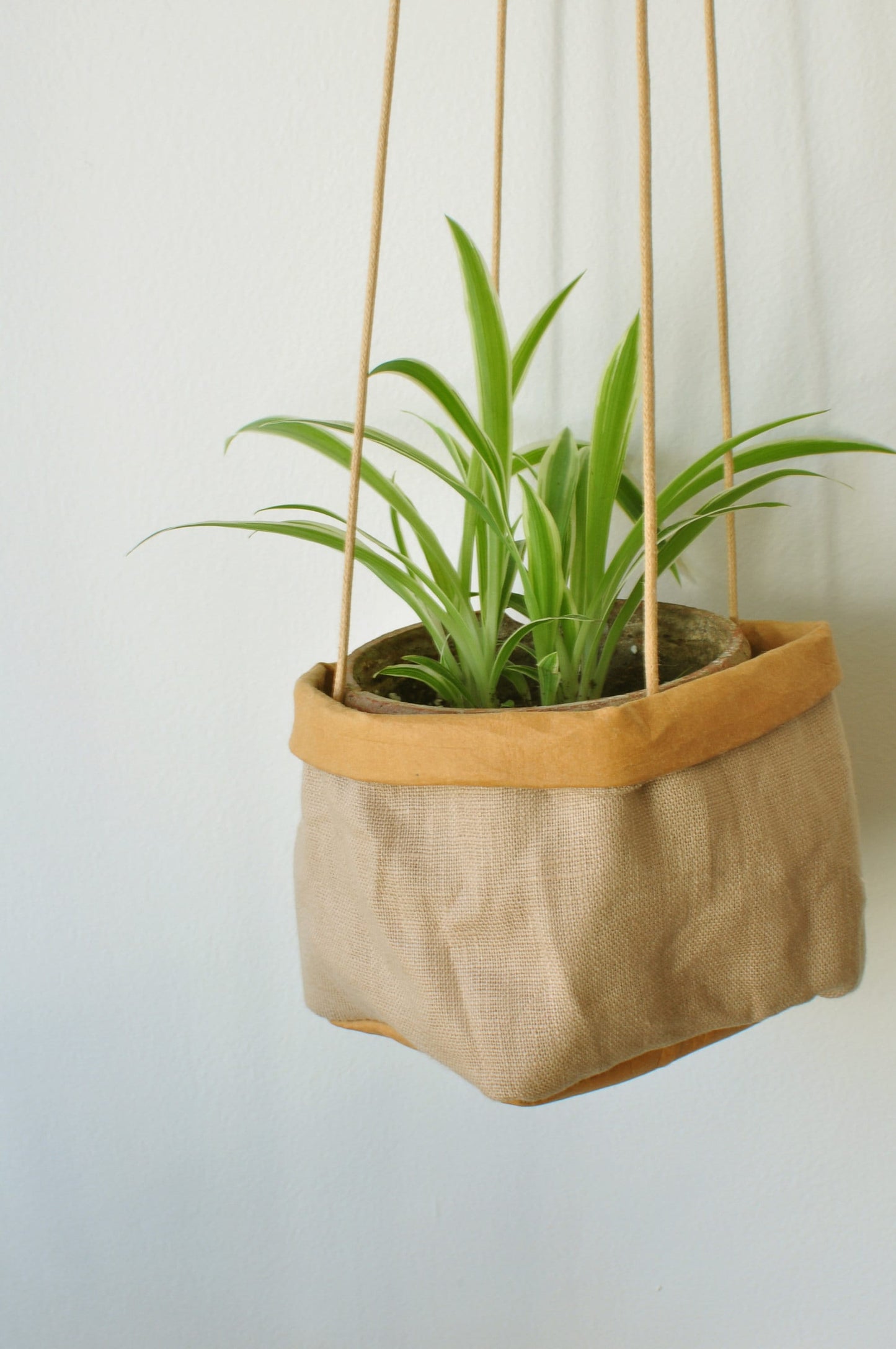 Planter, hanging paper planter made from washable reusable paper and Linen in yellow and pink beige. Vegan Leather planter for living room