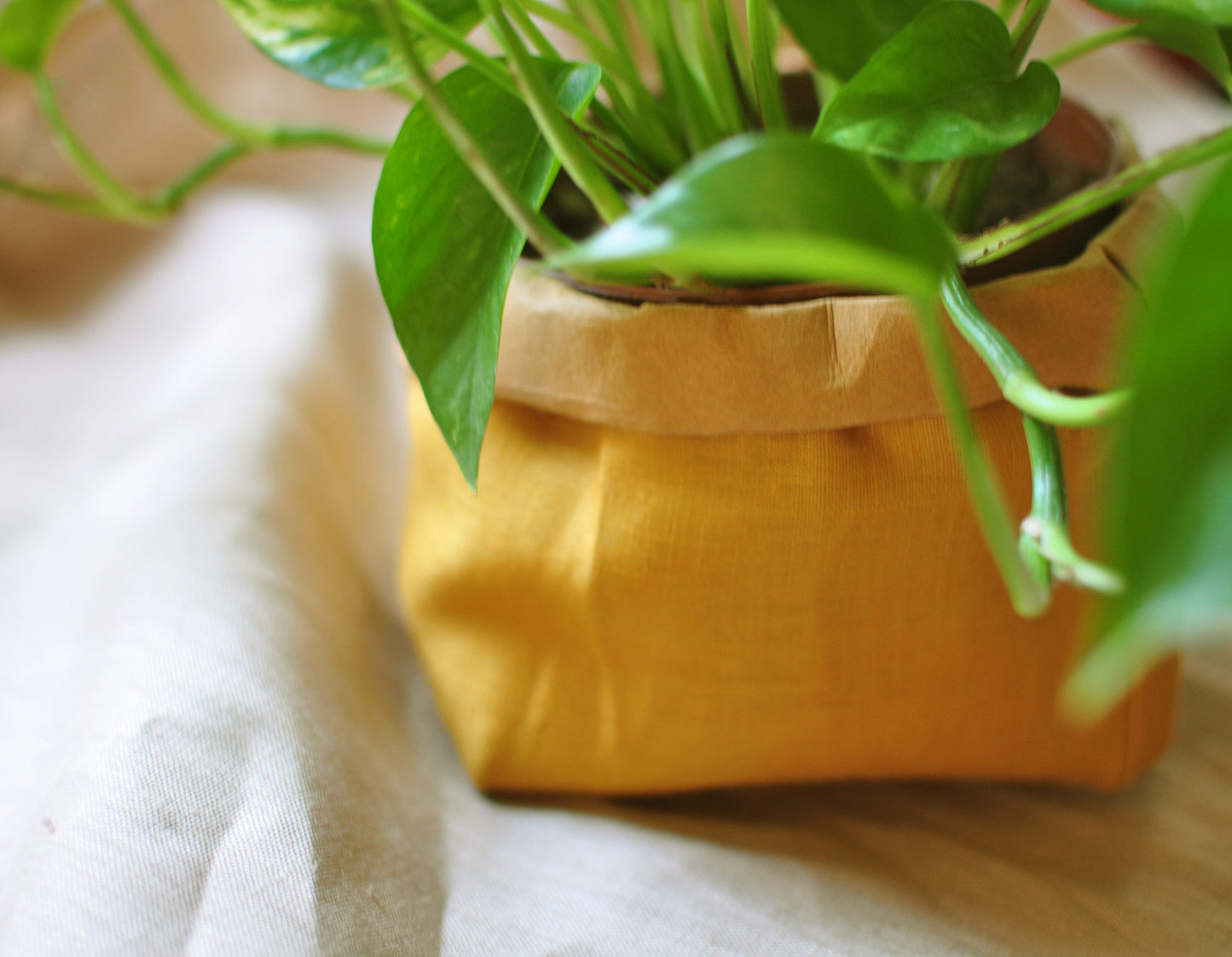 Planter, hanging paper planter made from washable reusable paper and Linen in yellow and pink beige. Vegan Leather planter for living room