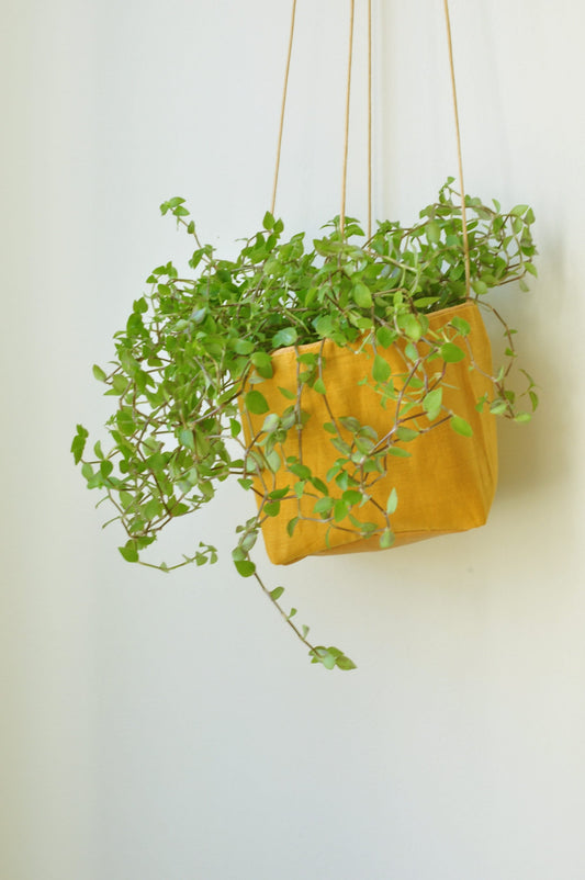 Planter, hanging paper planter made from washable reusable paper and Linen in yellow and pink beige. Vegan Leather planter for living room