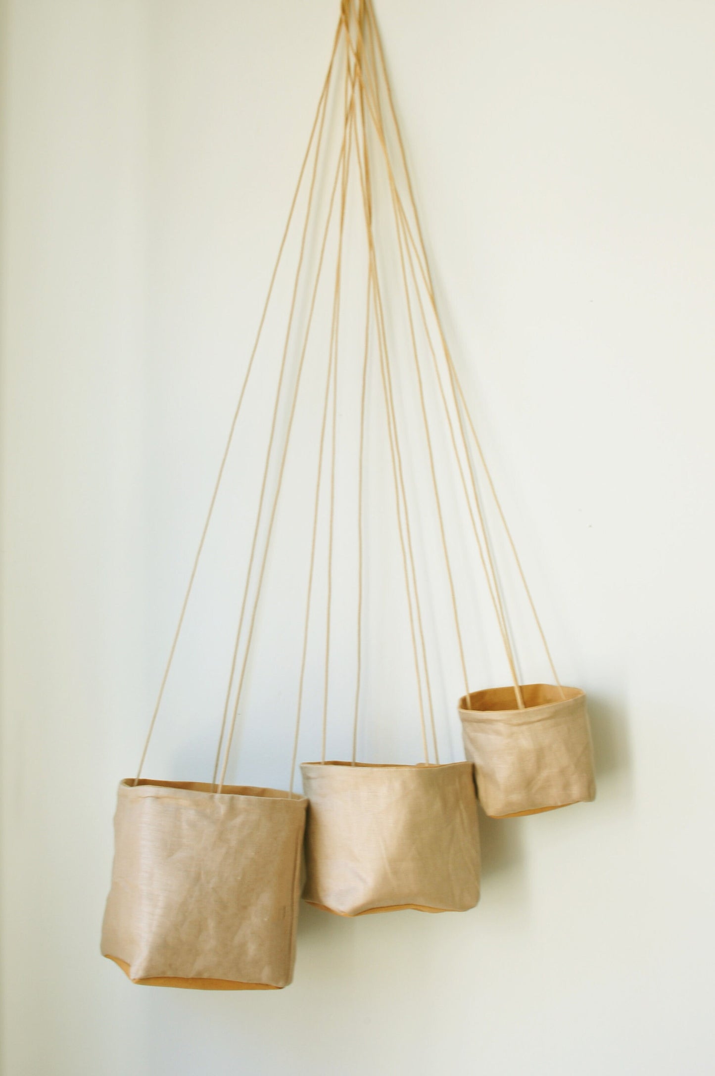 Planter, hanging paper planter made from washable reusable paper and Linen in yellow and pink beige. Vegan Leather planter for living room