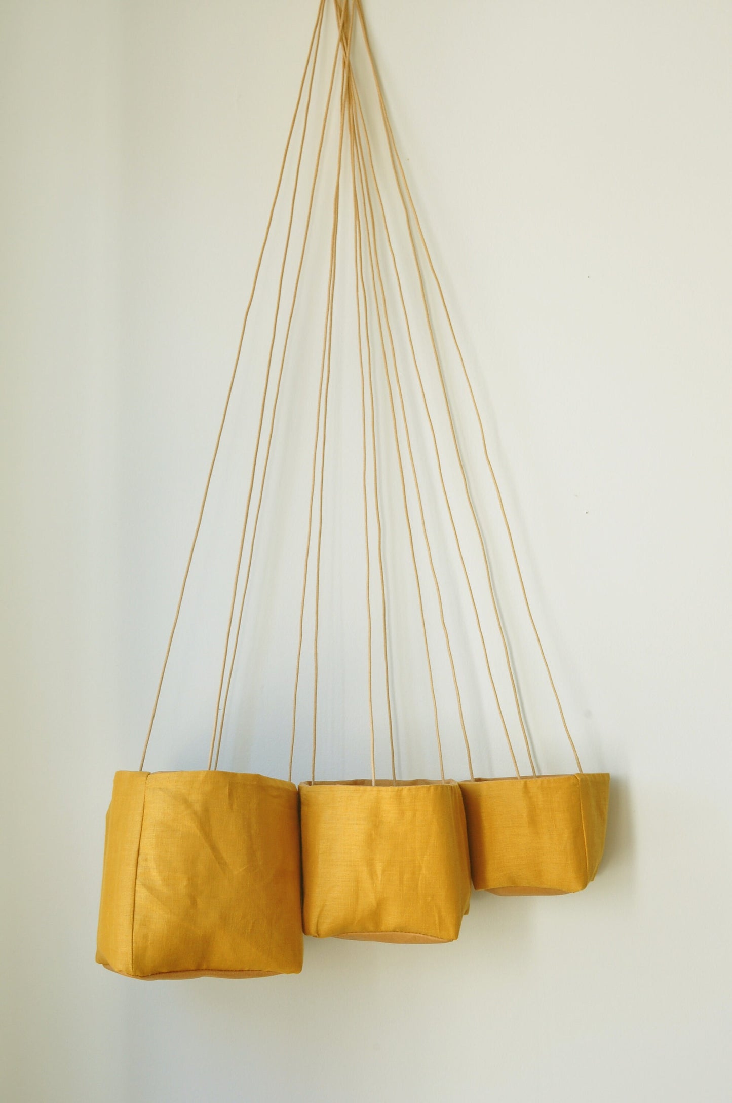 Planter, hanging paper planter made from washable reusable paper and Linen in yellow and pink beige. Vegan Leather planter for living room