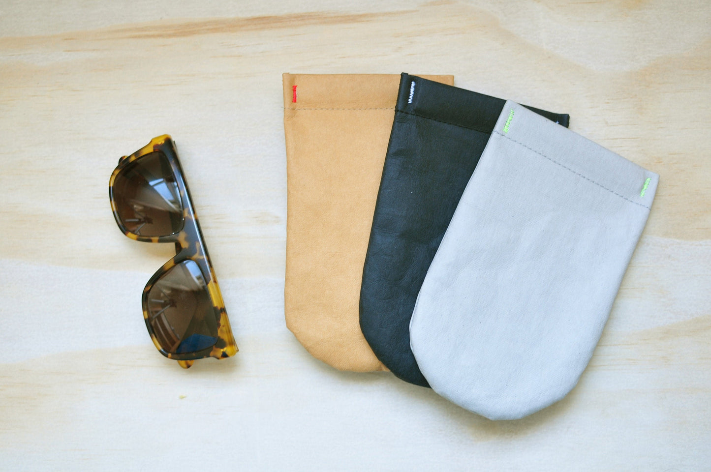 Eye glass case made from washable and reusable paper in BLACK, BROWN, GREY with snappy closure. Vegan Leather case as Pen & Sun glass case