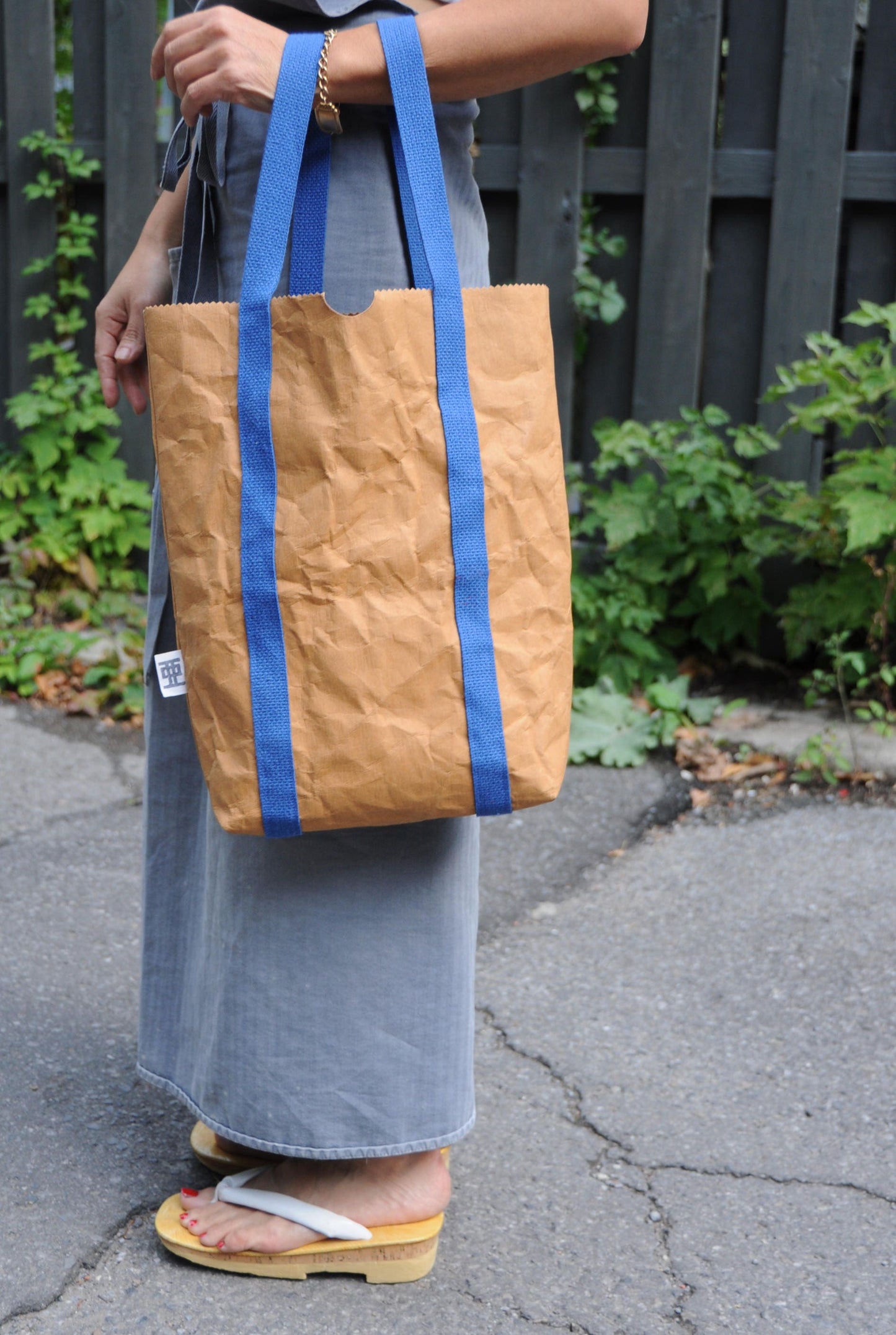 Black Two ways bag; Backpack and Tote back made from washable & reusable brown kraft paper