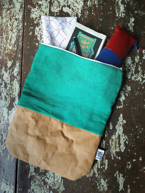 Fold over clutch bag made from washable kraft paper