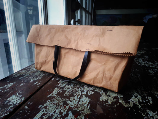 Fold over purse made from washable and reusable brown kraft paper