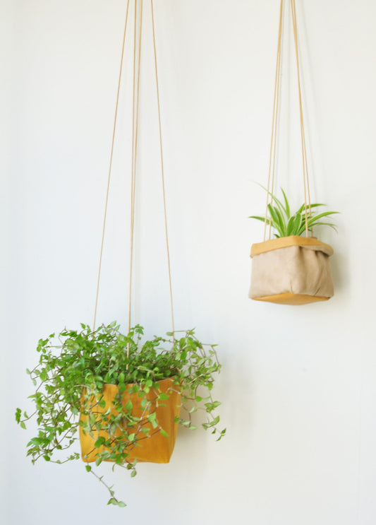 Planter, hanging paper planter made from washable reusable paper and Linen in yellow and pink beige. Vegan Leather planter for living room